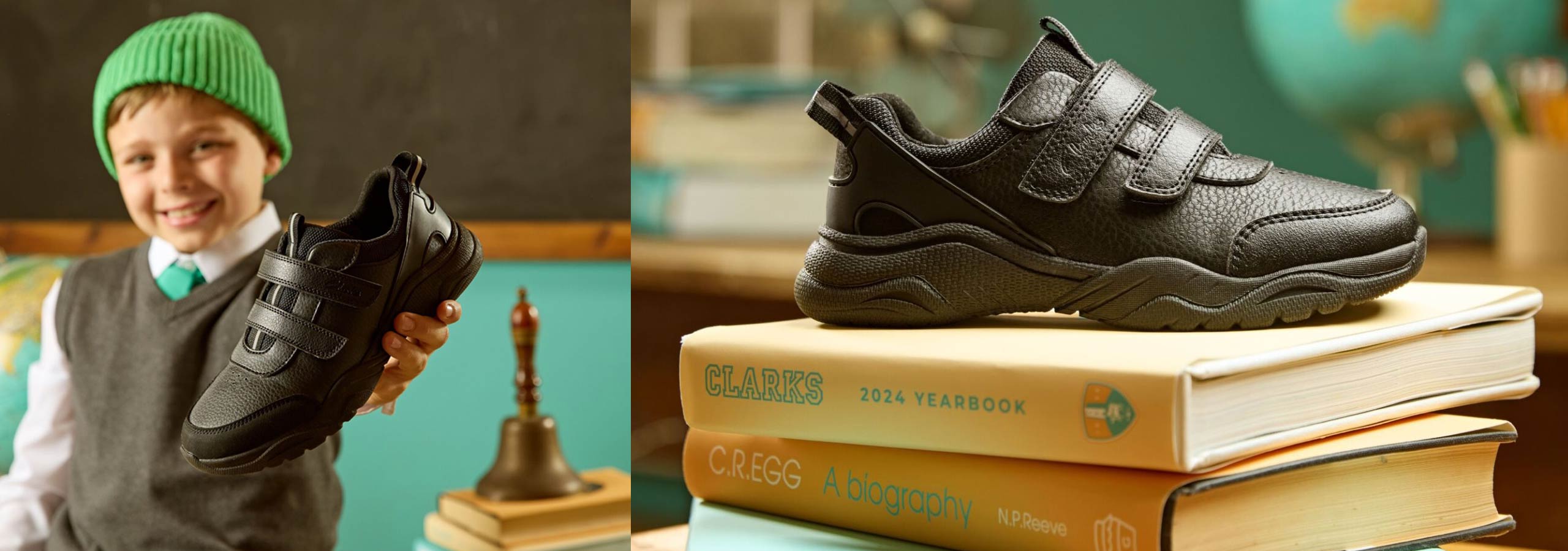 Child holding a black shoe next to a black shoe on books with a teal background